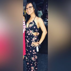 Floral halter open back black jumpsuit size S like new